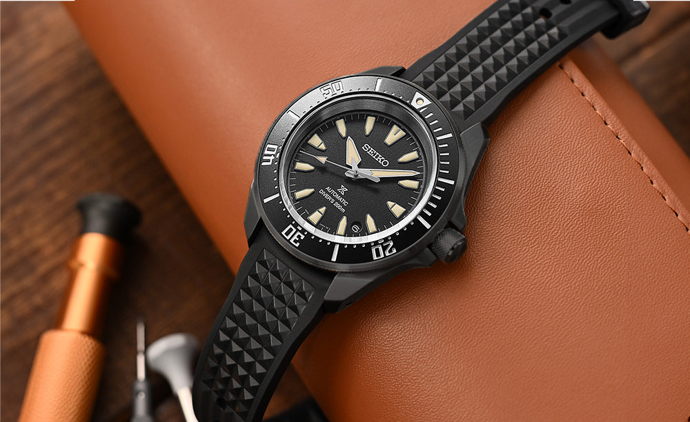 Black watch band on a seiko watch